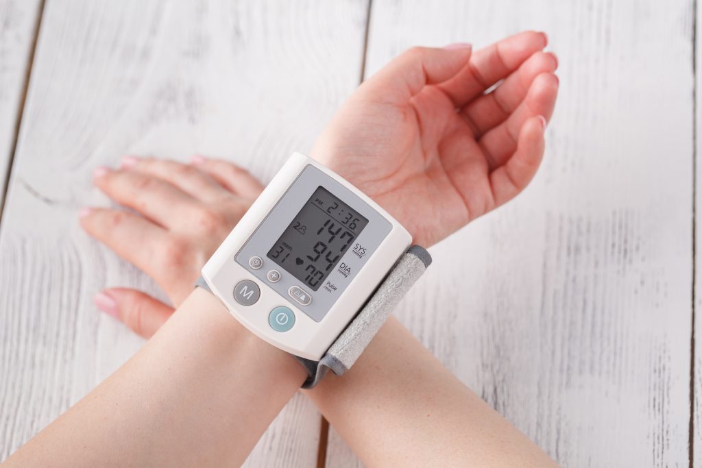 Medical device with metal dome switches for measuring blood pressure and heart rate used